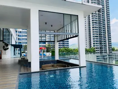 a pool in a building with tall buildings at Reizz by Aayu Residences - 10mins to KLCC, 2 mins to Gleneagles Hospital in Kuala Lumpur