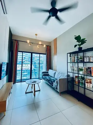 a living room with a couch and a ceiling fan at Reizz by Aayu Residences - 10mins to KLCC, 2 mins to Gleneagles Hospital in Kuala Lumpur