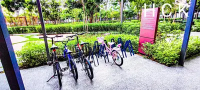 a group of bikes parked next to a sign at M Vertica in Kuala Lumpur