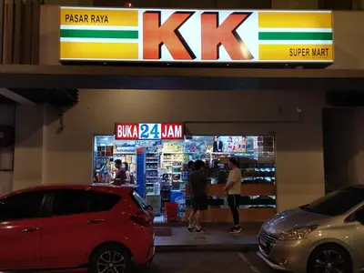 a kk store with people standing inside of it at M Vertica in Kuala Lumpur