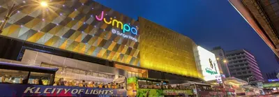 a large building with a bus in front of it at Fahrenheit 88 - Bukit Bintang in Kuala Lumpur