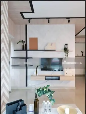 a living room with a table and a room with at Arte plus in Ampang