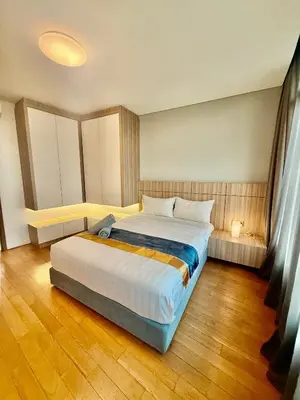 a bedroom with a large bed in a room at Vortex Apartment Near By Klcc in Kuala Lumpur