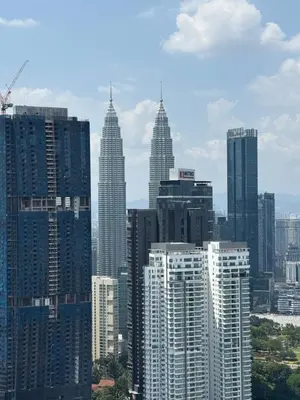 a view of a city skyline with tall buildings at AGILE SKY HOME Near Pavilion with TRX and GOLF View Including Swimming Pool in Kuala Lumpur