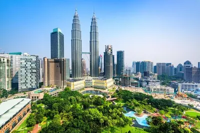 a view of a city with tall skyscrapers at Razak City Fully Air-Con Suite Sungai Besi Kuala Lumpur 57100 in Kuala Lumpur