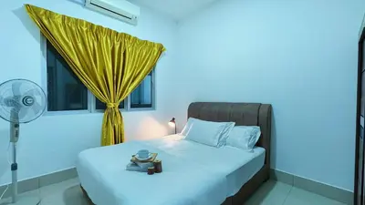 a bedroom with a bed with a fan and a window at Razak City Fully Air-Con Suite Sungai Besi Kuala Lumpur 57100 in Kuala Lumpur