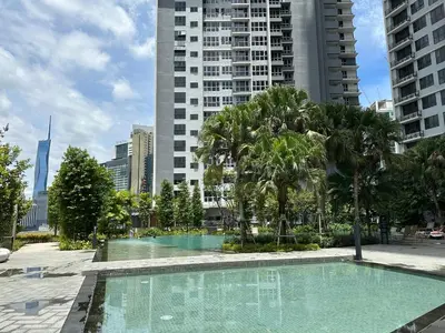 a swimming pool in a city with tall buildings at Agile Bukit Bintang TRX KL by Lilbean Space - 2B1R in Kuala Lumpur