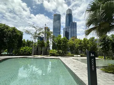 a swimming pool with a city skyline in the background at Agile Bukit Bintang TRX KL by Lilbean Space - 2B1R in Kuala Lumpur