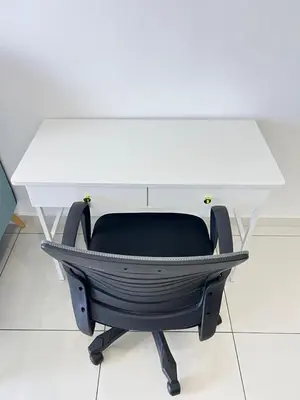 a white desk with a black chair under it at Cozy 2BR 2BR 2-5 Pax Kenwingston KL Genting View & Parking & Netflix 4505 in Kuala Lumpur