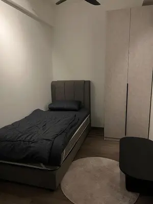 a bedroom with a bed and a closet at Luxury Black Suite Agile Bukit Bintang in Kuala Lumpur