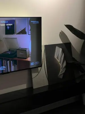 a flat screen tv sitting on top of a table at Luxury Black Suite Agile Bukit Bintang in Kuala Lumpur