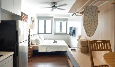 a small kitchen with a bed in a room at Cozy Studio l Riveria City l 1km to KL Sentral in Kuala Lumpur