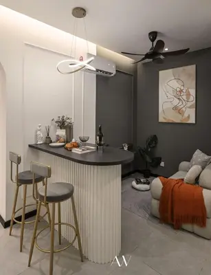 a kitchen with a bar and a bed in a room at Homey 2BR l Neu Suites l 5min to KL City in Kuala Lumpur