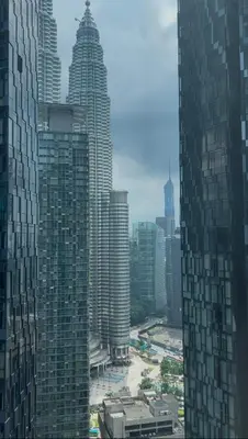 a view of a large city with tall buildings at One Star KLCC in Kuala Lumpur