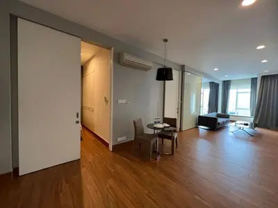 a living room with a table and a couch at Platinum Suites by Kuala Lumpur Malaysia in Kuala Lumpur