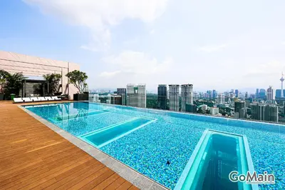 a swimming pool on the roof of a building at 24H Check in & Skypool - Riveria City Premium KL Suite in Kuala Lumpur