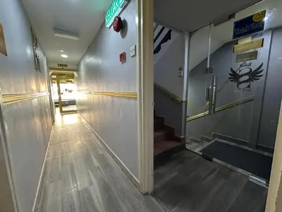 a hallway of a building with a hall way at SS Grey Hotel BB in Kuala Lumpur