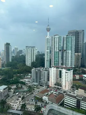 a city skyline with tall buildings in a city at Robertson Special Suites By Luna in Kuala Lumpur