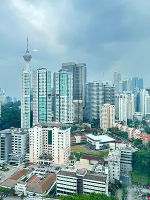 a large city with tall buildings in the background at Robertson Special Suites By Luna in Kuala Lumpur