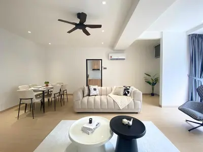 a living room with a couch and a table at Fahrenheit88 Opposite Pavilion KL Bukit Bintang in Kuala Lumpur