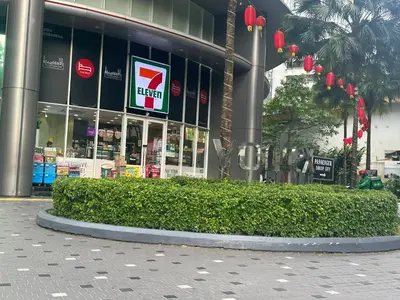 a building with a sign in front of it at Vortex klcc by Elham in Kuala Lumpur