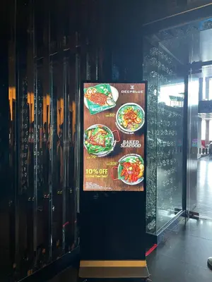 a sign on a wall with plates of food at Eastern Suites AT Platinum KLCC in Kuala Lumpur