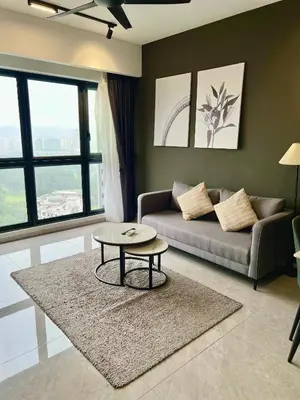 a living room with a couch and a table at Agile Bukit Bintang By Well Shaped in Kuala Lumpur