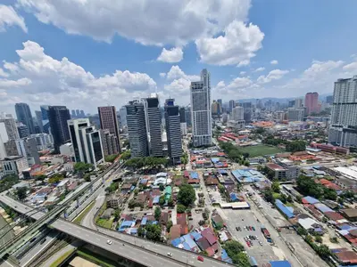 an aerial view of a city with tall buildings at Summer Suites Klcc 2BR Apartments by ATIQ in Kuala Lumpur