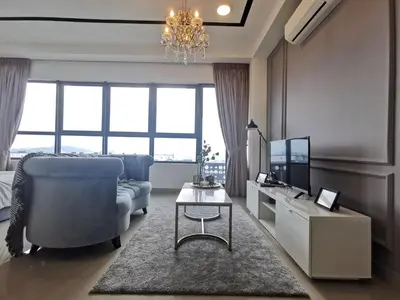 a living room with a couch and a table at Arte Plus Ampang Studio near KLCC - Living Signature in Kuala Lumpur