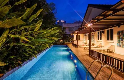a swimming pool on the side of a building at 68 Palms 03 l Midvalley l KL Sentral in Kuala Lumpur