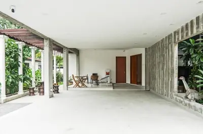 an empty porch of a house with plants at 68 Palms 03 l Midvalley l KL Sentral in Kuala Lumpur