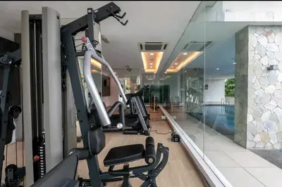 a gym with cardio equipment in a house at A3A l Near KLCC TRX l Santorini l 18 Guests in Kuala Lumpur