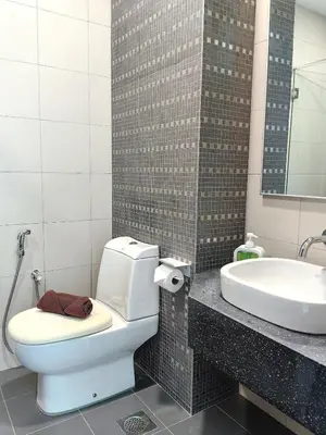 a bathroom with a toilet and a sink and a tub at A3A l Near KLCC TRX l Santorini l 18 Guests in Kuala Lumpur