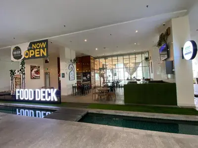 a food depot with a food clerk sign in a building at Skyfloat Infinity Hostel in Kuala Lumpur