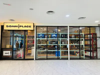 a store front with glass doors in a shopping mall at The Luxe & Colony KLCC By Comfort Dwellings in Kuala Lumpur