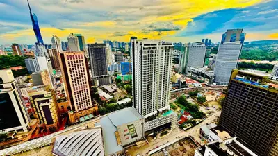 an aerial view of a city with tall buildings at Majestic Suites KLCC in Kuala Lumpur