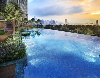 a large swimming pool with a city skyline in the background at M Vertica Cheras KL City Fully Air-Con Nice View Home in Kuala Lumpur