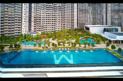 an overhead view of a large swimming pool in a city at Cozy Room in Kuala Lumpur