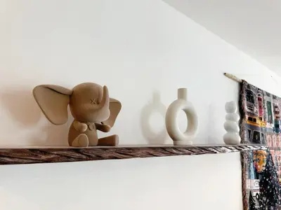 a shelf in a room with a stuffed animal on it at Cozy Studio l Riveria City l 1km to KL Sentral in Kuala Lumpur