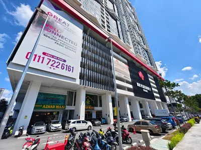 a group of motorcycles parked in front of a building at AimanDamia Homestay Setapak II in Kuala Lumpur