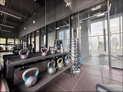 a room with a bunch of vases on display at Opus Residence by Cloud Escape in Kuala Lumpur