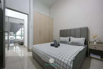 a bedroom with a large bed with a gray headboard at Instaworthy 2B2B - 6 pax - F&B & Mart - Chan Sow Lin in Kuala Lumpur