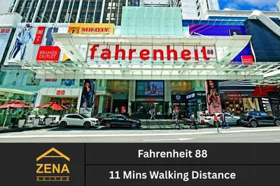 a city street with cars parked in front of a building at Downtown Condo KL City - 18 pax in Kuala Lumpur