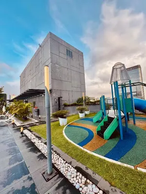 a playground in front of a building at Dorsett Suites Kuala Lumpur By AFA in Kuala Lumpur