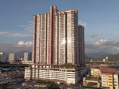 a large tall building in a city with buildings at PV21 Luxe Comfort 3 Bedroom Modern Homestay in Prime Location near Setapak Central Mall in Kuala Lumpur
