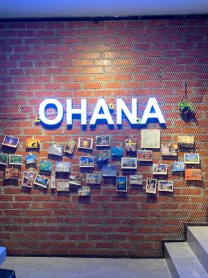 a brick wall with the word ohama on it at The Ohana Suite in Kuala Lumpur