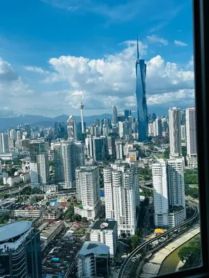 a view of a city with tall buildings at Nest Heaven Host in Kuala Lumpur