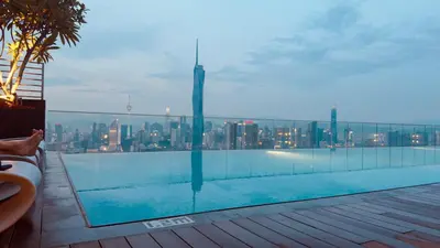 a swimming pool with a view of the city at Riveria City KL Sentral by Nest Suite in Kuala Lumpur