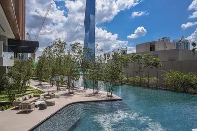 a swimming pool on the roof of a building at Happy holiday at Lucentia Residence in Kuala Lumpur