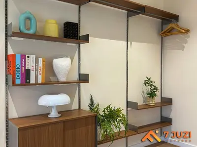 a room with a book shelf with books at Klcc Quill Cozy& Chill Suite 3-5Pax HD1080 Netflix in Kuala Lumpur